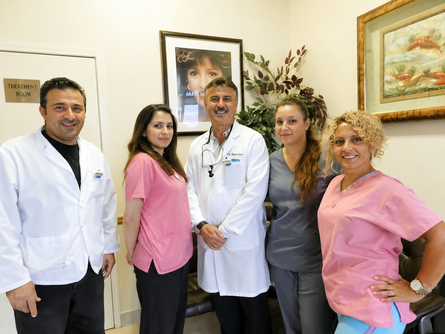 Dr. Korel and the Korel Dentistry team gathered in the office
